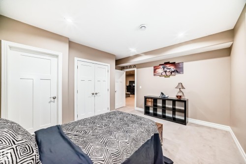 Bedroom featuring light carpet and a closet - 6 Wade Avenue, Leduc, AB - Indoor