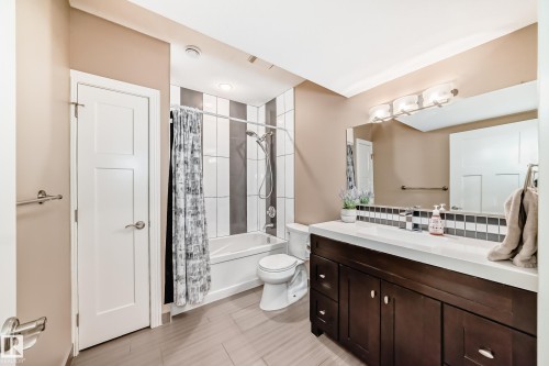 Bathroom with vanity and shower / tub combo with curtain - 6 Wade Avenue, Leduc, AB - Indoor Photo Showing Bathroom