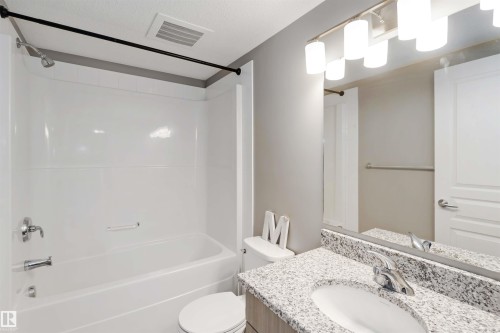 Bathroom with vanity and shower / bathtub combination - 101 3670 139 Avenue, Edmonton, AB - Indoor Photo Showing Bathroom