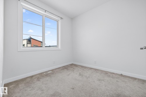 Spare room with baseboards and carpet - #5 15805 97 Ave, Edmonton, AB - Indoor Photo Showing Other Room