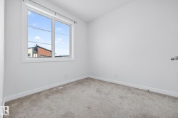 Spare room with baseboards and carpet - 