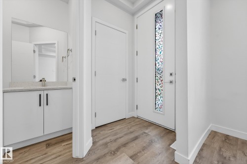 Entryway with light wood-style flooring - #5 15805 97 Ave, Edmonton, AB - Indoor Photo Showing Other Room