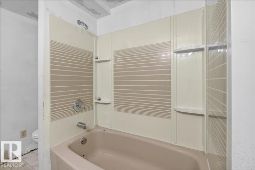 Bathroom with shower / bath combination and toilet - 2516 42 Street, Edmonton, AB - Indoor Photo Showing Bathroom