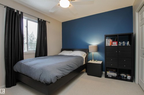 Carpeted bedroom featuring a ceiling fan - 2315 Lemieux Place, Edmonton, AB - Indoor Photo Showing Bedroom