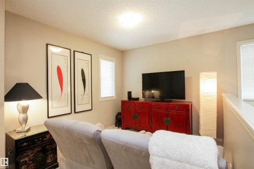 Living area with a textured ceiling - 2315 Lemieux Place, Edmonton, AB - Indoor Photo Showing Bedroom