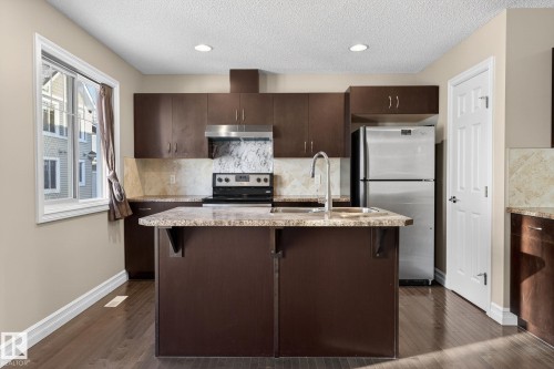 Edmonton, AB - Indoor Photo Showing Kitchen With Double Sink