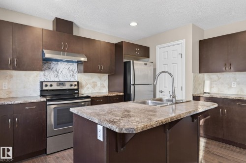 Edmonton, AB - Indoor Photo Showing Kitchen With Stainless Steel Kitchen With Double Sink With Upgraded Kitchen