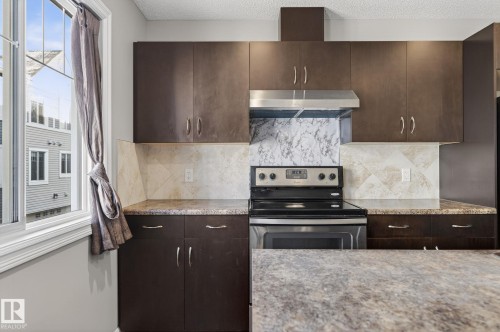 Edmonton, AB - Indoor Photo Showing Kitchen With Upgraded Kitchen