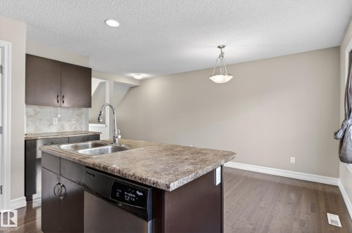 Edmonton, AB - Indoor Photo Showing Kitchen With Double Sink
