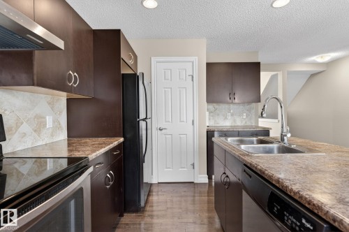 Edmonton, AB - Indoor Photo Showing Kitchen With Stainless Steel Kitchen With Double Sink