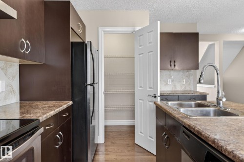 Edmonton, AB - Indoor Photo Showing Kitchen With Double Sink