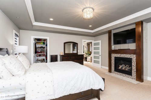 2410 Ashcraft Crescent, Edmonton, AB - Indoor Photo Showing Bedroom With Fireplace