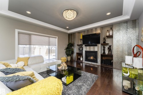 2410 Ashcraft Crescent, Edmonton, AB - Indoor Photo Showing Living Room With Fireplace