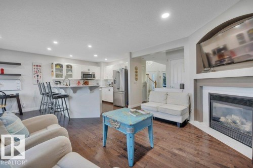4260 24 Street, Edmonton, AB - Indoor Photo Showing Living Room With Fireplace