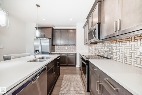 12345 85 Street, Edmonton, AB - Indoor Photo Showing Kitchen With Stainless Steel Kitchen With Double Sink With Upgraded Kitchen
