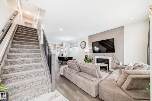 12345 85 Street, Edmonton, AB - Indoor Photo Showing Living Room With Fireplace