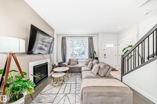 12345 85 Street, Edmonton, AB - Indoor Photo Showing Living Room With Fireplace