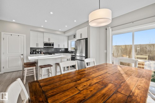 Dining space with recessed lighting and light wood-style flooring - 217 Larch Crescent, Leduc, AB - Indoor