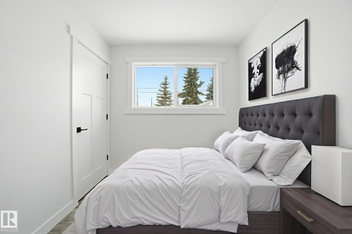 Bedroom featuring baseboards - 7112 132 Avenue, Edmonton, AB - Indoor