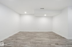 Unfurnished room with light wood-style floors and recessed lighting - 