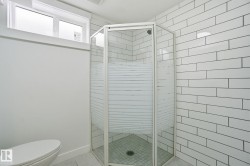 Bathroom with a stall shower - 