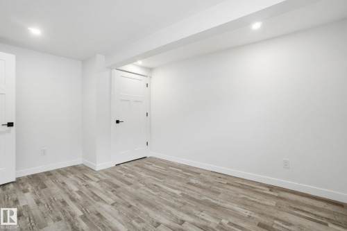 Spare room with light wood-type flooring and recessed lighting - 7112 132 Avenue, Edmonton, AB - Indoor Photo Showing Other Room