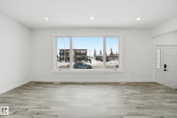Entrance foyer featuring light wood-style floors and recessed lighting - 
