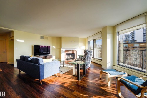 602 11710 100 Avenue, Edmonton, AB - Indoor Photo Showing Living Room With Fireplace