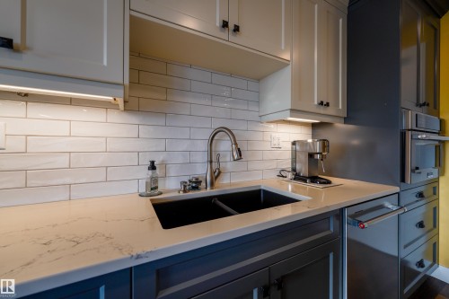 602 11710 100 Avenue, Edmonton, AB - Indoor Photo Showing Kitchen With Double Sink With Upgraded Kitchen