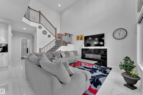 3704 41 Avenue, Beaumont, AB - Indoor Photo Showing Living Room With Fireplace