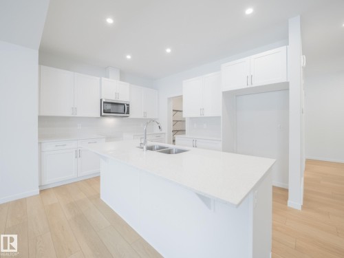 8731 224 Street, Edmonton, AB - Indoor Photo Showing Kitchen With Double Sink With Upgraded Kitchen