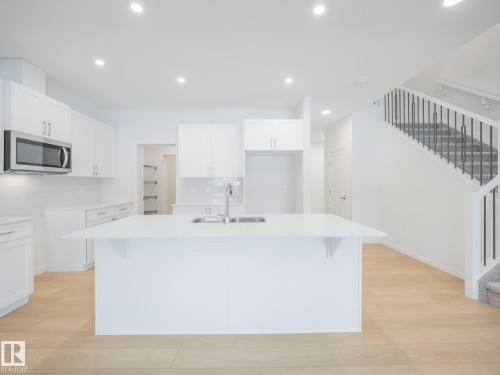 8731 224 Street, Edmonton, AB - Indoor Photo Showing Kitchen With Double Sink With Upgraded Kitchen
