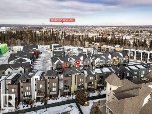 Snowy aerial view featuring a residential view - 125 1304 Rutherford Road, Edmonton, AB - Outdoor