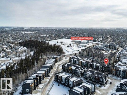 View of snowy aerial view - 125 1304 Rutherford Road, Edmonton, AB - Outdoor With View