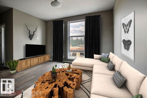 Living area with wood finished floors and a textured ceiling - 125 1304 Rutherford Road, Edmonton, AB - Indoor Photo Showing Living Room