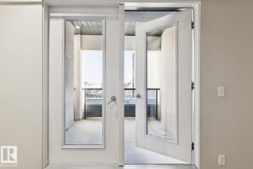 Property entrance featuring french doors - 208 1350 Windermere Way, Edmonton, AB -  Photo Showing Other Room