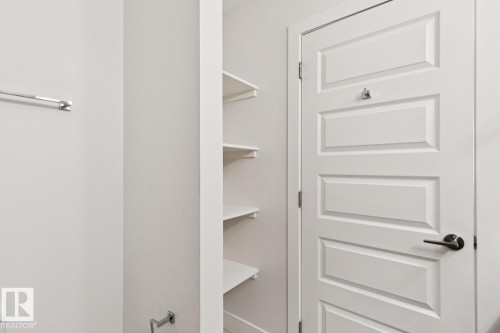 View of pantry - 208 1350 Windermere Way, Edmonton, AB - Indoor