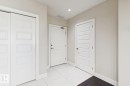 Tiled entryway featuring baseboards and recessed lighting - 208 1350 Windermere Way, Edmonton, AB  - Indoor Photo Showing Other Room 