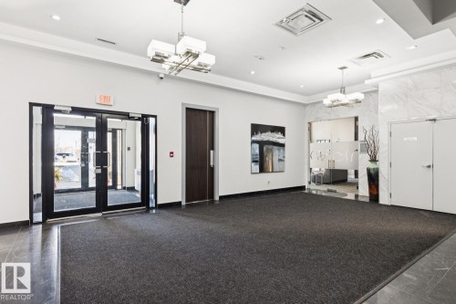 Common area with recessed lighting - 208 1350 Windermere Way, Edmonton, AB - Indoor Photo Showing Other Room
