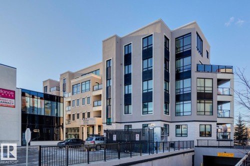 View of building exterior - 208 1350 Windermere Way, Edmonton, AB - Outdoor With Balcony