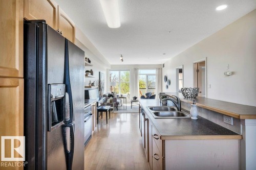 214 9507 101 Avenue, Edmonton, AB - Indoor Photo Showing Kitchen With Double Sink