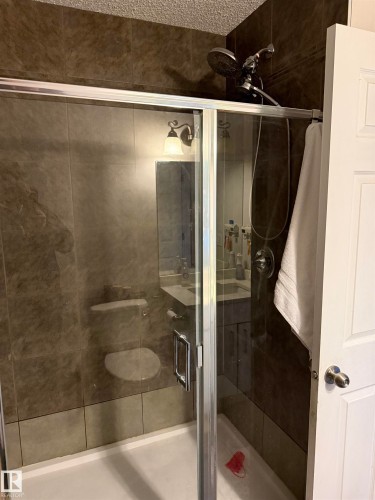 Bathroom featuring a shower stall - 11 15128 22 Street, Edmonton, AB - Indoor Photo Showing Bathroom
