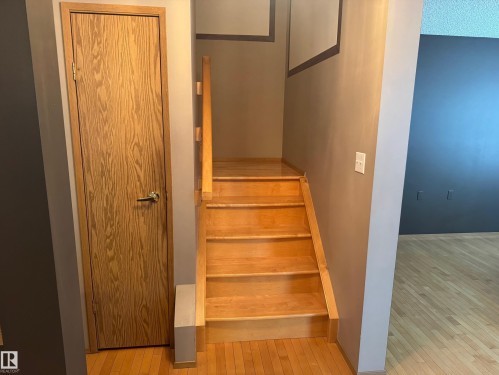 Stairs featuring hardwood / wood-style flooring - 6562 158 Avenue, Edmonton, AB - Indoor Photo Showing Other Room
