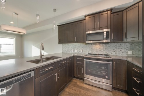 106 71 Festival Way, Sherwood Park, AB - Indoor Photo Showing Kitchen With Double Sink With Upgraded Kitchen
