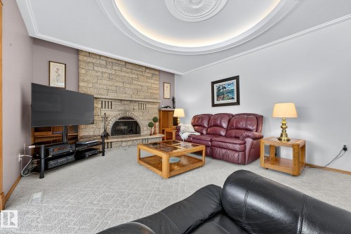 3455 Hill View Crescent, Edmonton, AB - Indoor Photo Showing Living Room With Fireplace
