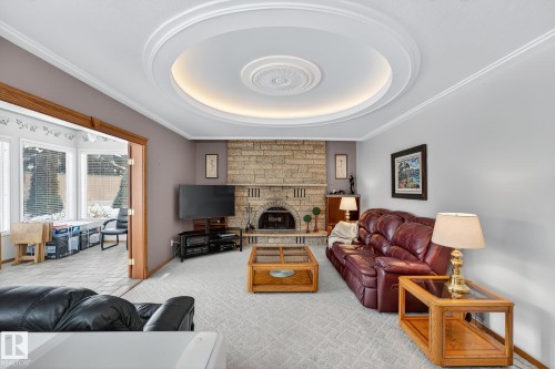 3455 Hill View Crescent, Edmonton, AB - Indoor Photo Showing Living Room With Fireplace