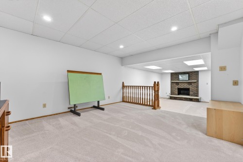 3455 Hill View Crescent, Edmonton, AB - Indoor Photo Showing Other Room With Fireplace