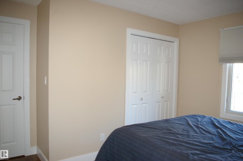 Bedroom featuring baseboards and a closet - 168 Warwick Road, Edmonton, AB - Indoor Photo Showing Bedroom