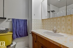 Full bath with vanity and curtained shower - 