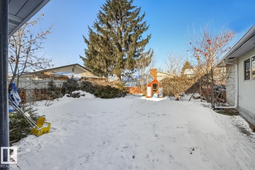 Yard layered in snow featuring a shed - 11516 152A Avenue, Edmonton, AB - Outdoor